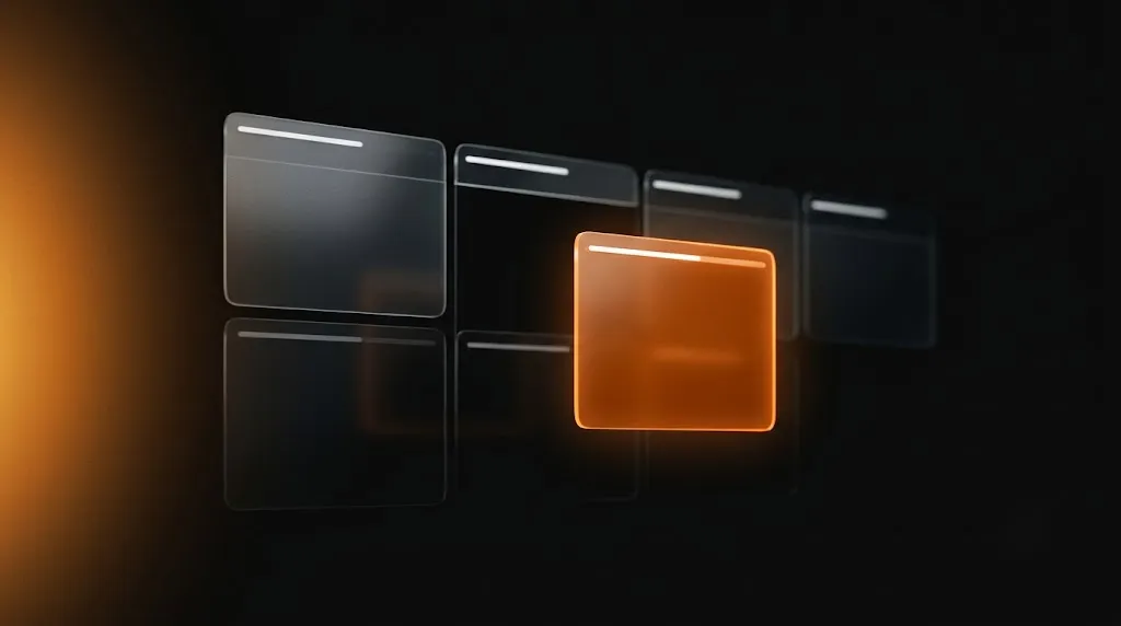 A row of dark frosted glass panels in a black space, with one panel in front glowing warm orange